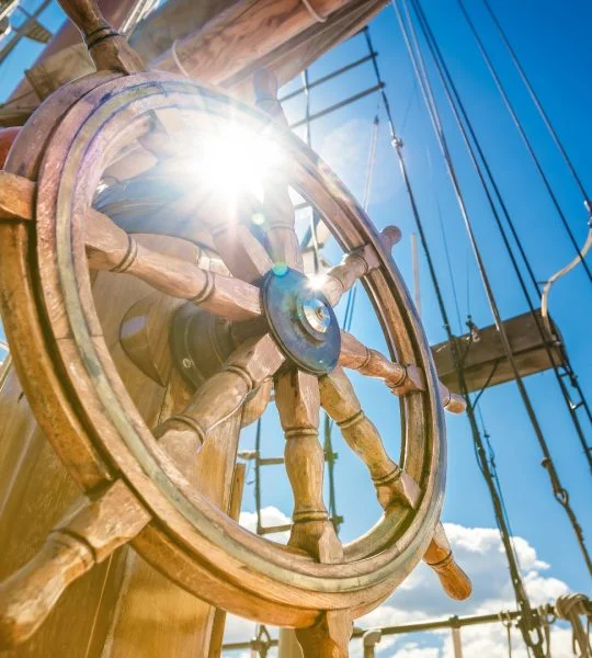 Wooden steering wheel of a sailing ship