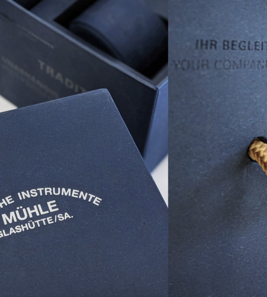 Detailbild Auszug Uhrenverpackung und Kordel