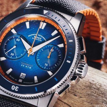 Close-up of the Sportivo Active Chronograph lying on a branch